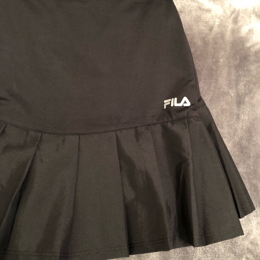 Tennis/golf  skirt NWOT . FILA black.